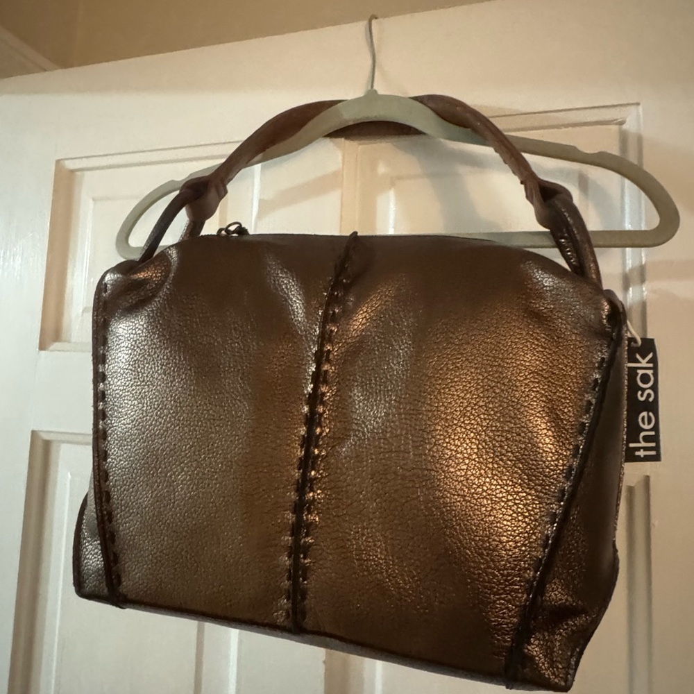 The Sak Bronze Shoulder Bag with Whipstitch Detail